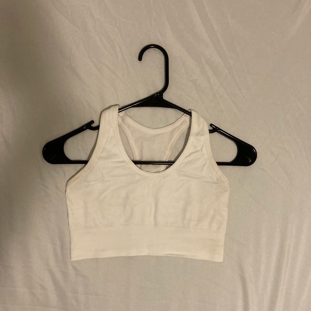 It is a white sport bra size small